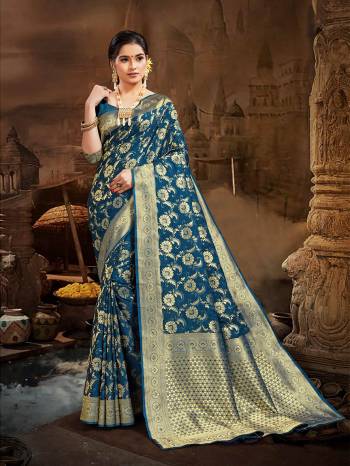 Celebrate This Festive Season And Partywear In This Very Pretty Blue Colored Designer Saree Paired With Blouse. This Saree and Blouse Are Silk Based Beautified With Detailed Wevon Heavy Deasigner Work. 