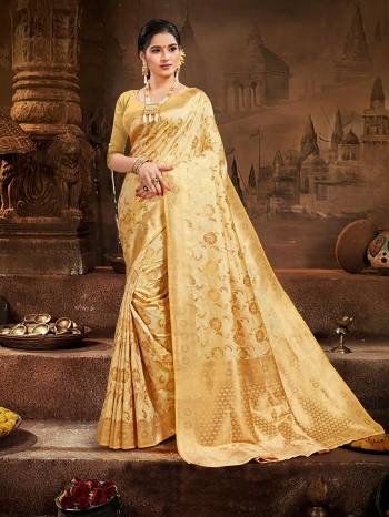 Celebrate This Festive Season And Partywear In This Very Pretty Beige Colored Designer Saree Paired With Blouse. This Saree and Blouse Are Silk Based Beautified With Detailed Wevon Heavy Deasigner Work. 