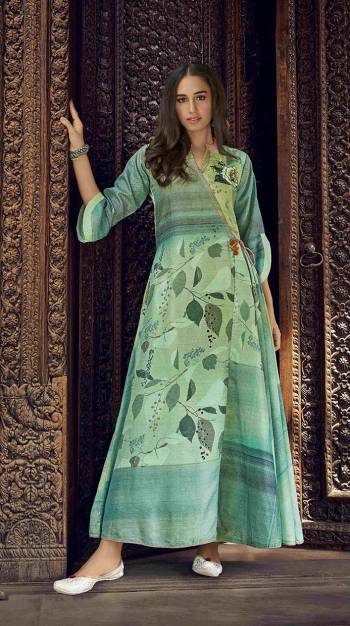 Flaunt Your Rich And Elegant Taste Wearing This Designer Readymade Long Gown In Fine Color. This  Pretty Gown Is Fabricated On Silk Blend Beautified With Designer Printed. Its Fabric Is Soft Towards Skin And Easy To Carry All Day Long. 