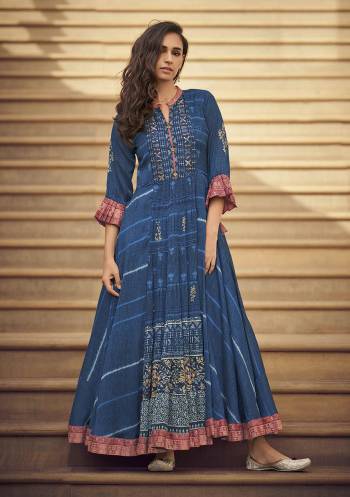 Flaunt Your Rich And Elegant Taste Wearing This Designer Readymade Long Gown In Fine Color. This  Pretty Gown Is Fabricated On Silk Blend Beautified With Designer Printed. Its Fabric Is Soft Towards Skin And Easy To Carry All Day Long. 