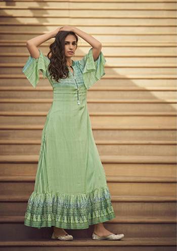 Flaunt Your Rich And Elegant Taste Wearing This Designer Readymade Long Gown In Fine Color. This  Pretty Gown Is Fabricated On Rayon Silk Beautified With Designer Printed. Its Fabric Is Soft Towards Skin And Easy To Carry All Day Long. 