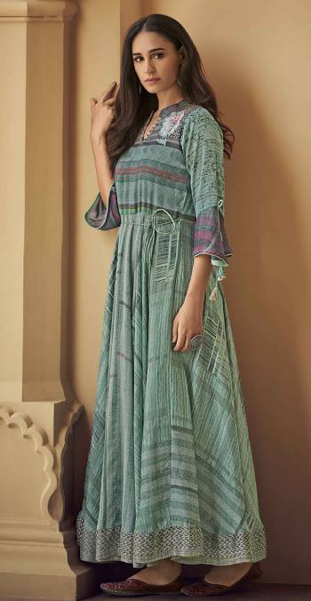 Attrective Your Rich And Elegant Taste Wearing This Designer Readymade Long Gown In Fine Color. This  Pretty Gown Is Fabricated On Rayon Silk Beautified With Designer Printed. Its Fabric Is Soft Towards Skin And Easy To Carry All Day Long. 