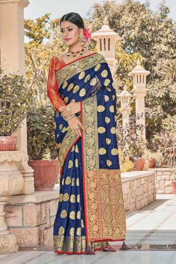 Celebrate This Festive Season In This Very Pretty Fancy Colored Designer Saree Paired With Contrasted Blouse. This Saree and Blouse Are Silk Based Beautified With Detailed Wevon Designer Work Saree. 