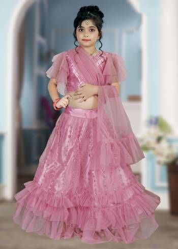 Garb This Heavy Designer Kidswear Readymade Lehenga Choli In All Over Color. This Heavy Sequance Embroidered Lehenga Choli Is Net Based Paired With Net Fabricated Dupatta, It Is Beautified With Lovely Detailed Embroidery Giving An Attractive Look.