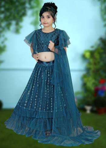 Garb This Heavy Designer Kidswear Readymade Lehenga Choli In All Over Color. This Heavy Sequance Embroidered Lehenga Choli Is Net Based Paired With Net Fabricated Dupatta, It Is Beautified With Lovely Detailed Embroidery Giving An Attractive Look.