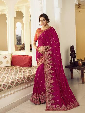 Look Attractive Wearing This Partywear Saree Are Fine Saree Paired With Contrasted Colored Blouse.  This Heavy Designer Embroidery Stone Work Saree Is Vichitra Silk Based And Blouse Are Dupion Fabric. Which Gives A Rich Look To Your Personality. Buy This Pretty Saree Now.