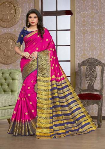 Grab This Pretty Elegant Looking Designer Saree In Dark Color Paired With Contrasting Colored Blouse. This Saree And Blouse Are Silk Based Beautified With Wevon Jari Designer Work. Buy Now.