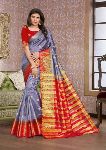 Grab This Pretty Elegant Looking Designer Saree In Dark Color Paired With Contrasting Colored Blouse. This Saree And Blouse Are Silk Based Beautified With Wevon Jari Designer Work. Buy Now.