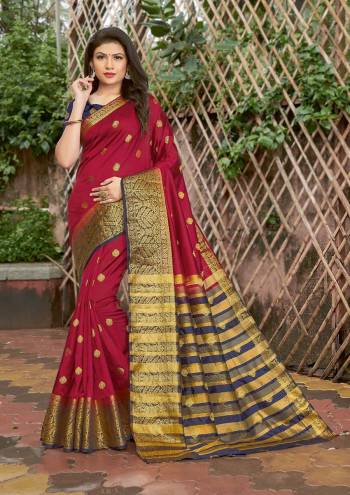 Grab This Pretty Elegant Looking Designer Saree In Dark Color Paired With Contrasting Colored Blouse. This Saree And Blouse Are Silk Based Beautified With Wevon Jari Designer Work. Buy Now.