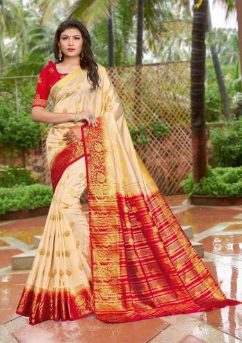 Grab This Pretty Elegant Looking Designer Saree In Dark Color Paired With Contrasting Colored Blouse. This Saree And Blouse Are Silk Based Beautified With Wevon Jari Designer Work. Buy Now.