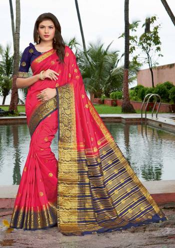 Grab This Pretty Elegant Looking Designer Saree In Dark Color Paired With Contrasting Colored Blouse. This Saree And Blouse Are Silk Based Beautified With Wevon Jari Designer Work. Buy Now.