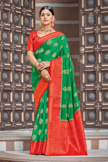 Celebrate This Festive Season In This Very Pretty Fancy Colored Designer Saree Paired With Contrasting Color Blouse. This Saree and Blouse Are Silk Based Beautified With Detailed Wevon Designer Jari Work Saree. 