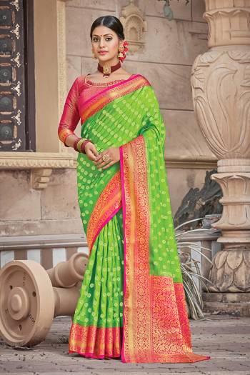 Celebrate This Festive Season In This Very Pretty Fancy Colored Designer Saree Paired With Contrasting Color Blouse. This Saree and Blouse Are Silk Based Beautified With Detailed Wevon Designer Jari Work Saree. 