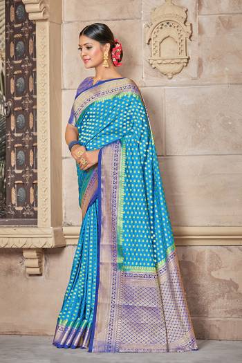 Celebrate This Festive Season In This Very Pretty Fancy Colored Designer Saree Paired With Contrasting Color Blouse. This Saree and Blouse Are Silk Based Beautified With Detailed Wevon Designer Jari Work Saree. 