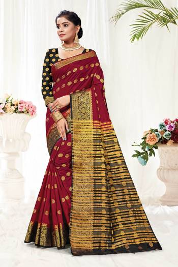 Attrective This Pretty Elegant Looking Designer Saree In Dark Color Paired With Contrasting Colored Blouse. This Saree And Blouse Are Silk Based Beautified With Wevon Jari Designer Work. Buy Now.