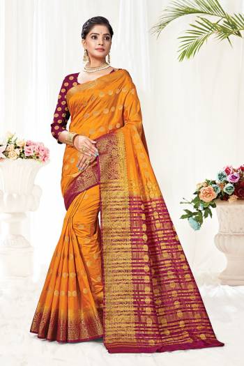 Attrective This Pretty Elegant Looking Designer Saree In Dark Color Paired With Contrasting Colored Blouse. This Saree And Blouse Are Silk Based Beautified With Wevon Jari Designer Work. Buy Now.