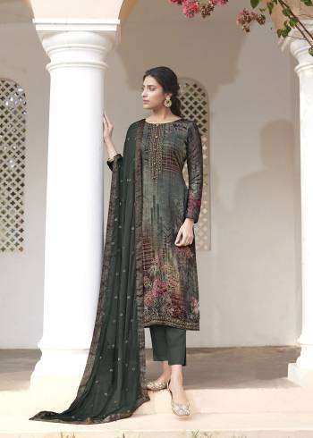 Garb This Designer Long Length Suit In Fine Color.?Its Pretty Heavy Designer Digital Printed With Embroidery And Hand Work Top Is Jam Satin Based Paired With Cotton Bottom And Chiffon Fabricated Dupatta Which Gives An Attractive To The Suit.