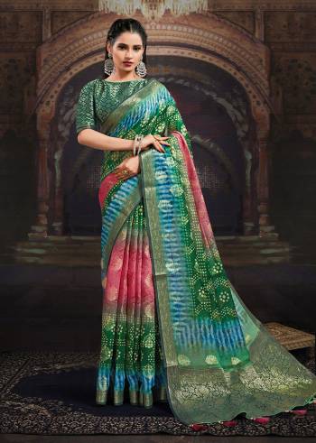 Look Traditional Ethnic Wear Saree Are Fine Saree Paired With Matching Blouse.This Heavy Designer Wevon Work With Bandhej Digital Printed Saree And Blouse Are Chanderi Fabric. Which Gives A Rich Look To Your Personality. Buy This Pretty Saree Now.