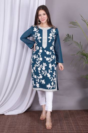 Attrective Look Collection This Designer Redymade Suit In Blue Color Paired. Its Printed Top Is Georgette And Bottom Are Silk Satin Fabric With Designer Embroidery Work . Buy this Suit Now.