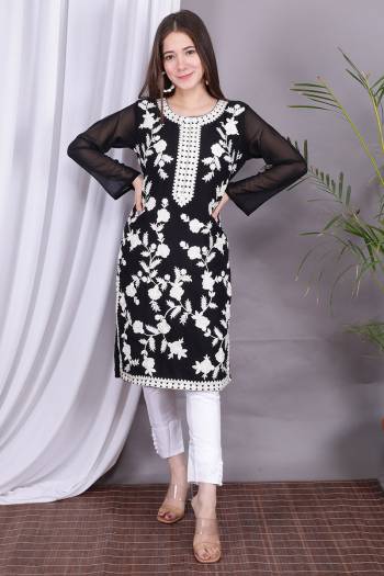 Attrective Look Collection This Designer Redymade Suit In Black Color Paired. Its Printed Top Is Georgette And Bottom Are Silk Satin Fabric With Designer Embroidery Work . Buy this Suit Now.