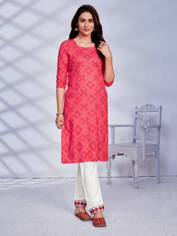 Attrective Look Collection This Designer Redymade Suit In Lovely Color Paired. Its Printed Top Is Rayon Are Bandhej Printed And Bottom Are Cotton Fabric Are Designer Embroidery Work . Buy this Suit Now.