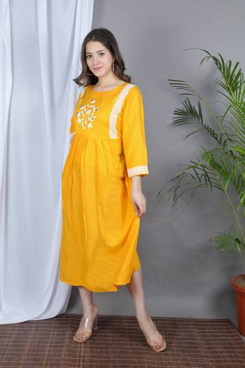 Grab This Designer Readymade Long Kurti In Fine Color Fabricated On Rayon. It Is Beautified With Designer Hand Work With Lace Work And You Can Pair This Up For A Festive Look. Buy Now.