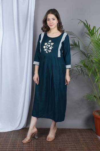 Grab This Designer Readymade Long Kurti In Fine Color Fabricated On Rayon. It Is Beautified With Designer Hand Work With Lace Work And You Can Pair This Up For A Festive Look. Buy Now.