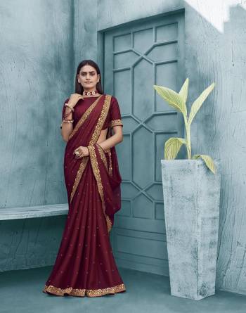 Adorn The Pretty Angelic Look Wearing This Heavy Swaroski Work Designer Saree In Fine Color Paired With Matching Blouse. This Saree Is Fabricated On Chiffon Paired With Broket Fabricated Blouse. Its Pretty Color Pallete Will Give An Attractive Look To Your Personality. 