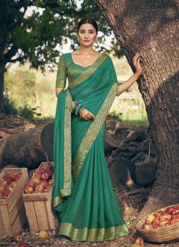 Adorn The Pretty Angelic Look Wearing This Heavy Jacquard Border And Blouse Designer Saree In Fine Color Paired With Matching Blouse. This Saree Is Fabricated On Chiffon Paired With Broket Fabricated Blouse. Its Pretty Color Pallete Will Give An Attractive Look To Your Personality. 