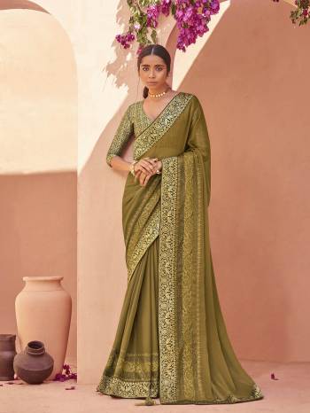 Attrective Look This Pretty Angelic Look Wearing This Heavy Designer Embroidery With Swaroski Work Saree In Fine Color Paired With Matching Blouse. This Saree Is Fabricated On Chiffon Paired With Broket Fabricated Blouse. Its Pretty Color Pallete Will Give An Attractive Look To Your Personality. 