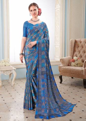 Look Attractive Wearing This Partywear Saree Are Fine Saree Paired With Blouse.  This Heavy Designer Prined Saree Is Crepe Based And Blouse Are Crepe Fabric. Which Gives A Rich Look To Your Personality. Buy This Pretty Saree Now.