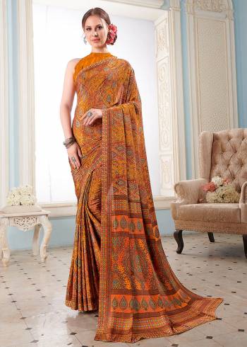 Attractive Look Wearing This Partywear Saree Are Fine Saree Paired With Blouse.  This Heavy Designer Prined Saree Is Crepe Based And Blouse Are Crepe Fabric. Which Gives A Rich Look To Your Personality. Buy This Pretty Saree Now.