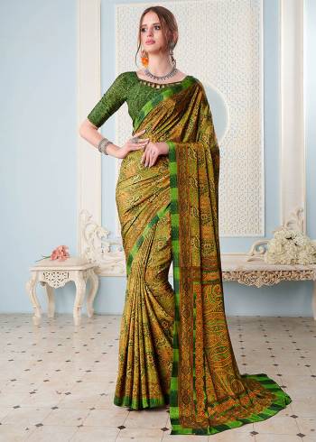 Attractive Look Wearing This Partywear Saree Are Fine Saree Paired With Blouse.  This Heavy Designer Prined Saree Is Crepe Based And Blouse Are Crepe Fabric. Which Gives A Rich Look To Your Personality. Buy This Pretty Saree Now.