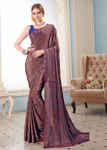 Attractive Look Wearing This Partywear Saree Are Fine Saree Paired With Blouse.  This Heavy Designer Prined Saree Is Crepe Based And Blouse Are Crepe Fabric. Which Gives A Rich Look To Your Personality. Buy This Pretty Saree Now.