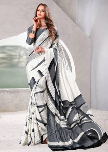 Look Party Wear Saree Are Fine Saree Paired With Matching Blouse.This Heavy Designer Printed Saree Is Crepe Silk Based And Blouse Are Crepe Silk Fabric. Which Gives A Rich Look To Your Personality. Buy This Pretty Saree Now.