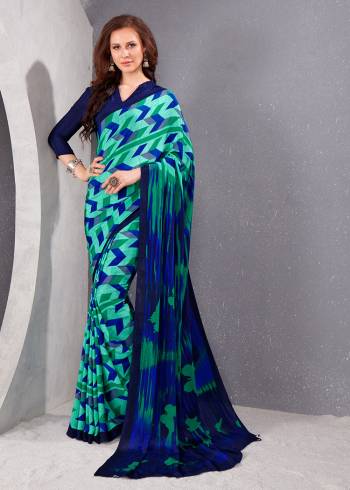 Garb This Party Wear Saree Are Fine Saree Paired With Matching Blouse.This Heavy Designer Printed Saree Is Crepe Silk Based And Blouse Are Crepe Silk Fabric. Which Gives A Rich Look To Your Personality. Buy This Pretty Saree Now.