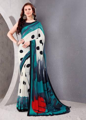 Garb This Party Wear Saree Are Fine Saree Paired With Matching Blouse.This Heavy Designer Printed Saree Is Crepe Silk Based And Blouse Are Crepe Silk Fabric. Which Gives A Rich Look To Your Personality. Buy This Pretty Saree Now.