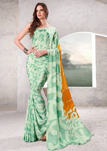 Garb This Party Wear Saree Are Fine Saree Paired With Matching Blouse.This Heavy Designer Printed Saree Is Crepe Silk Based And Blouse Are Crepe Silk Fabric. Which Gives A Rich Look To Your Personality. Buy This Pretty Saree Now.