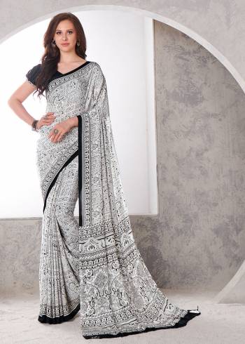 Garb This Party Wear Saree Are Fine Saree Paired With Matching Blouse.This Heavy Designer Printed Saree Is Crepe Silk Based And Blouse Are Crepe Silk Fabric. Which Gives A Rich Look To Your Personality. Buy This Pretty Saree Now.