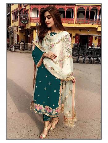 Attrective Look This Designer Suit In Fine Color Paired With Dupatta. Its Heacy Embroidery And Moti Work Top Is Fabricated On Faux Georgette Paired With Santoon Bottom And Soft Net Fabricated Dupatta. Buy this Suit Now.