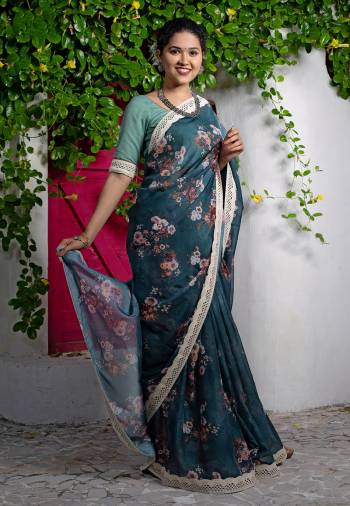 Look Attractive Wearing This Partywear Saree Are Fine Saree Paired With Contrasted Colored Blouse.  This Heavy Designer Digital Printed Saree Is Organza Based And Blouse Are Khadi Cotton Fabric. Which Gives A Rich Look To Your Personality. Buy This Pretty Saree Now.