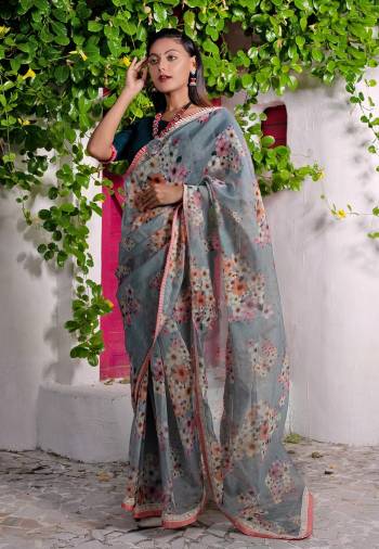 Look Attractive Wearing This Partywear Saree Are Fine Saree Paired With Contrasted Colored Blouse.  This Heavy Designer Digital Printed Saree Is Organza Based And Blouse Are Khadi Cotton Fabric. Which Gives A Rich Look To Your Personality. Buy This Pretty Saree Now.