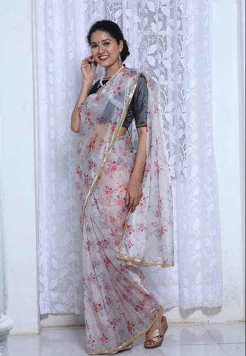 Look Attractive Wearing This Partywear Saree Are Fine Saree Paired With Contrasted Colored Blouse.  This Heavy Designer Digital Printed Saree Is Silk Organza Based And Blouse Are Califonia Satin Fabric. Which Gives A Rich Look To Your Personality. Buy This Pretty Saree Now.