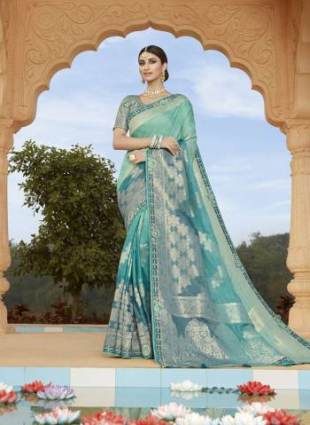 Super Attractive Look Wearing This Partywear Saree Are Fine Saree Paired With Contrasted Colored Blouse.  This Heavy Designer Wevon With Embroidery Work Lace And Blouse Saree Is Dola Silk Based And Blouse Are Dola Silk Fabric. Which Gives A Rich Look To Your Personality. Buy This Pretty Saree Now.