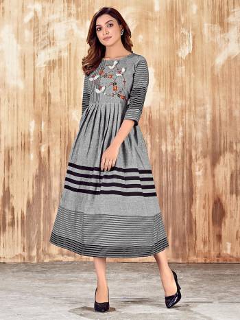 Grab This Readymade Long Kurti In Fine Color Fabricated On Cotton Wevon Designer Beautified With Hand Embroidery Work. It Is Light In Weight And Easy To Carry All Day Long. 