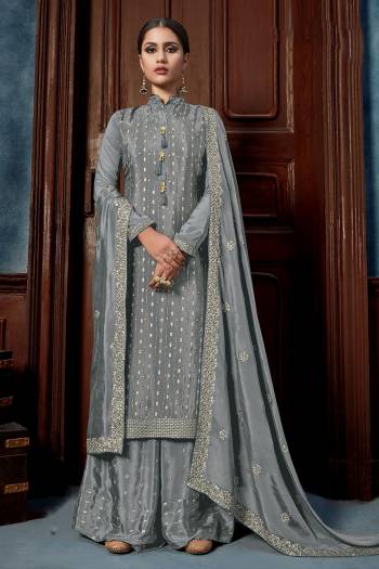 Look Pretty This Designer Long Length Suit In Lovely Dusty Color.?Its Pretty Heavy Designer Sequance Embroidred,Hand Work Top Is Chinon Based Paired With Chinon Bottom And Chinon Fabricated Dupatta Which Gives An Attractive To The Suit.