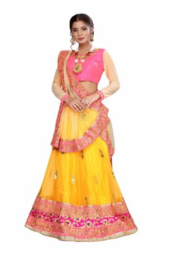 Garb This Designer Lehenga Choli In Fine Color. This Designer Embroidery And  Lehenga Choli Is Art Silk Based Paired With Net Fabricated Dupatta, It Is Beautified With Lovely Attractive Look.