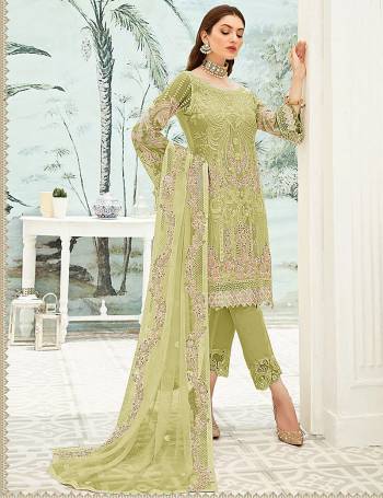 Garb This Designer Long Length Pakistani Suit In Lovely Light Color.?Its Pretty Heavy Designer Embroidred Work Top Is Grorgette Based Paired With Santoon Bottom And Soft Net Fabricated Dupatta Which Gives An Attractive To The Suit.