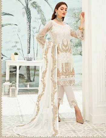 Garb This Designer Long Length Pakistani Suit In Lovely Light Color.?Its Pretty Heavy Designer Embroidred Work Top Is Grorgette Based Paired With Santoon Bottom And Soft Net Fabricated Dupatta Which Gives An Attractive To The Suit.