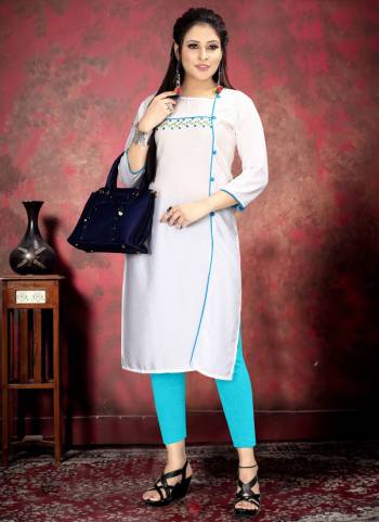 Grab This Designer Readymade Long Kurti In Color Fabricated On Rayon. It Is Beautified With Designer Hand Work And You Can Pair This Up For A Festive Look. Buy Now.